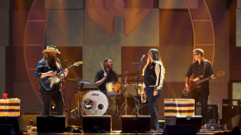 Chris Stapleton performs with his wife and band