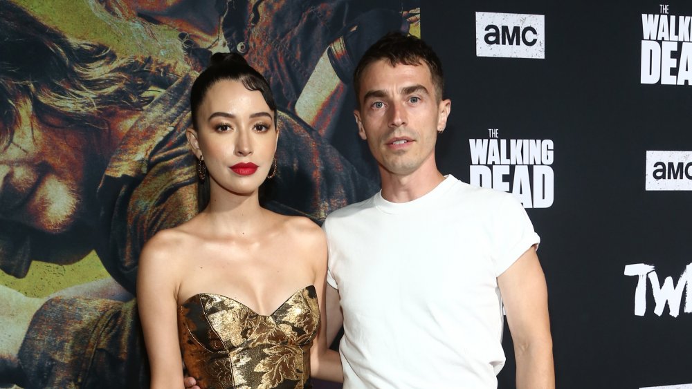 Christian Serratos and David Boyd at the Walking Dead Premiere and Party in 2019