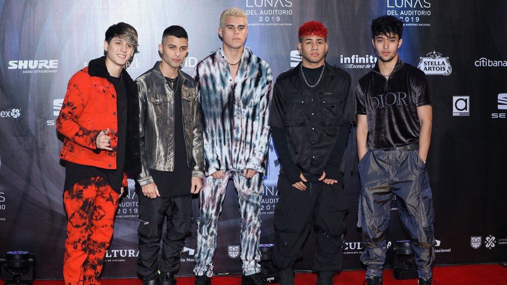 CNCO posing for a 2019 red carpet event 