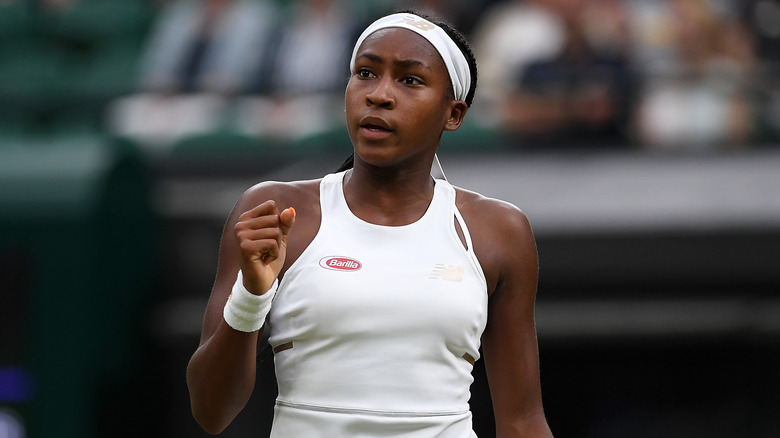 Coco Gauff walking on tennis court