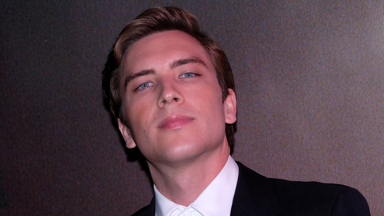 Cody Fern against grey background