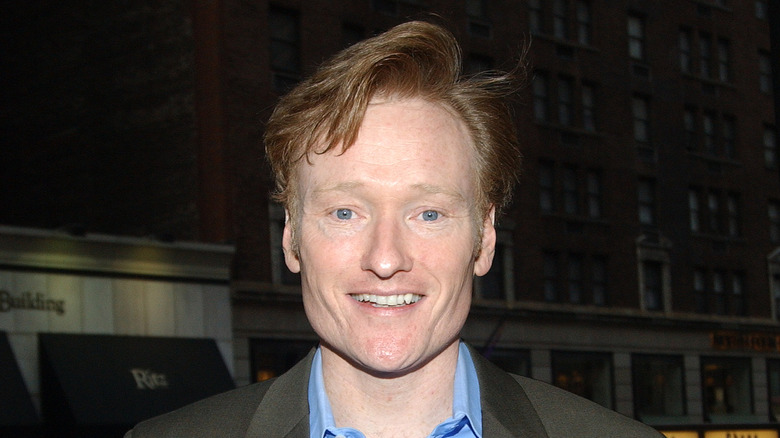 Conan O'Brien smiling outside