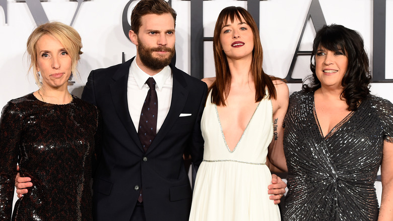 Dakota Johnson, Jamie Dornan, EL James, Sam Taylor-Johnson posing