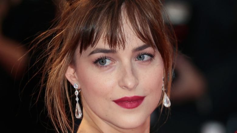 Dakota Johnson wearing fuchsia lipstick