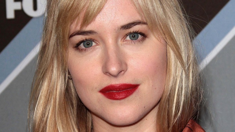 Dakota Johnson in red lipstick