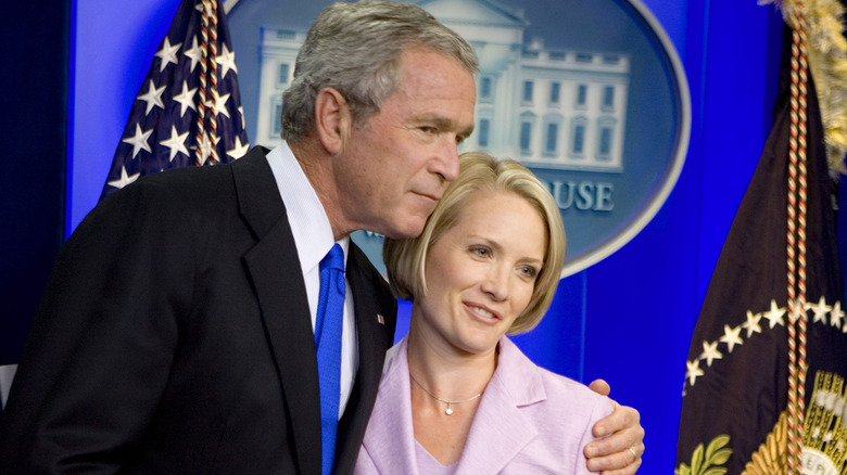 George W. Bush and Dana Perino embracing