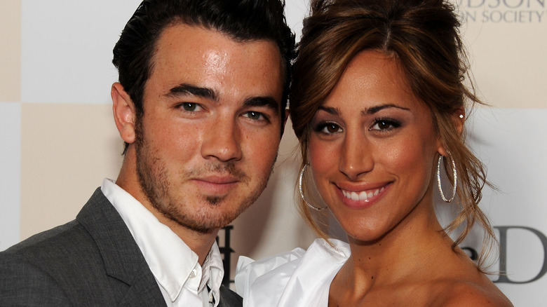 Danielle and Kevin Jonas posing