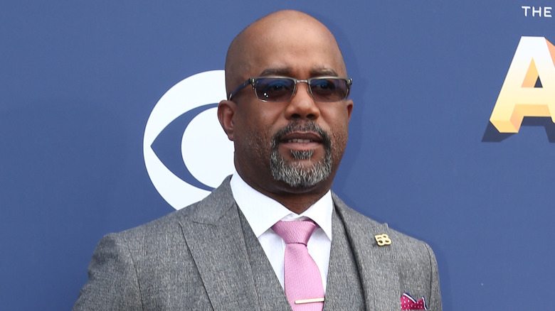 Darius Rucker in three-piece suit