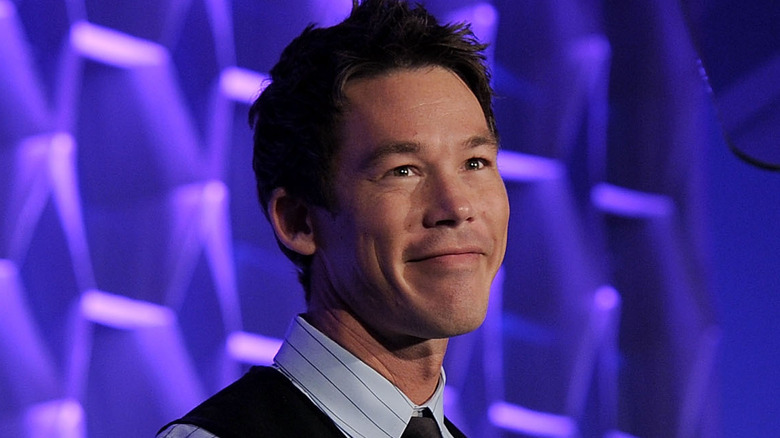 David Bromstad posing for cameras