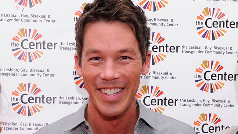 David Bromstad posing for cameras