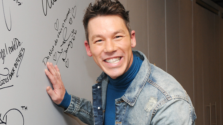 David Bromstad posing for cameras