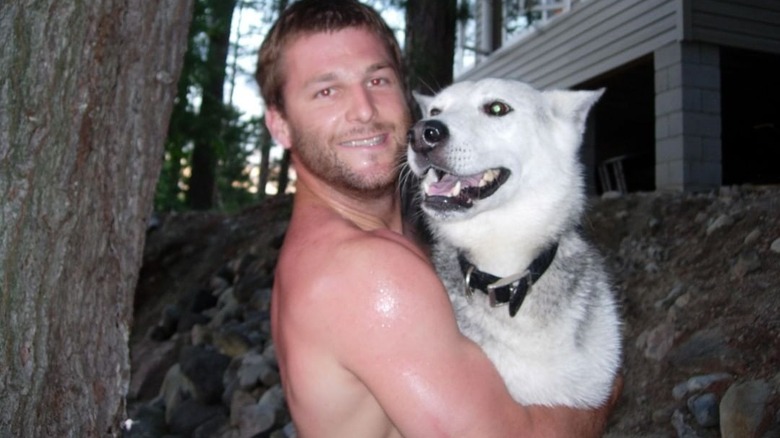 Dave Salmoni holding dog