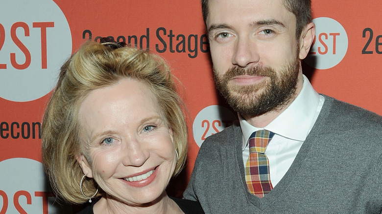 Debra Jo Rupp posing with Topher Grace