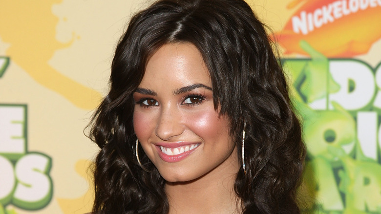 Demi Lovato smiling on the red carpet