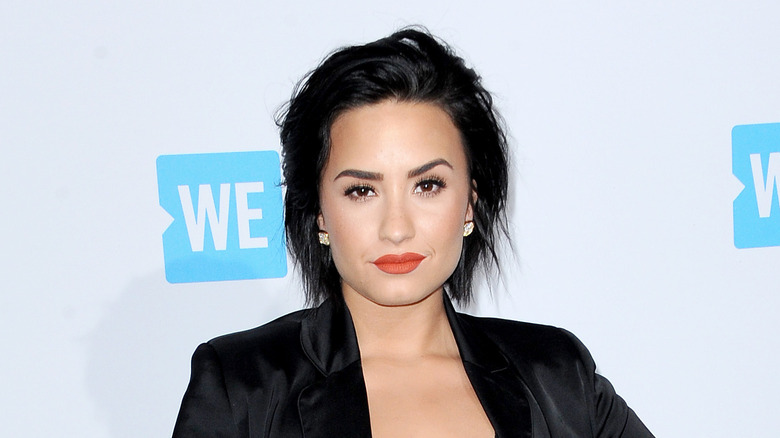 Demi Lovato in orange lipstick