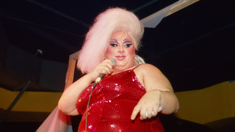 Divine performing onstage