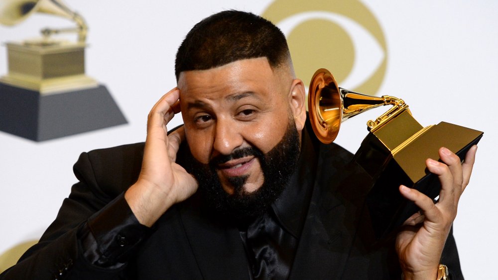 DJ Khaled holding a Grammy