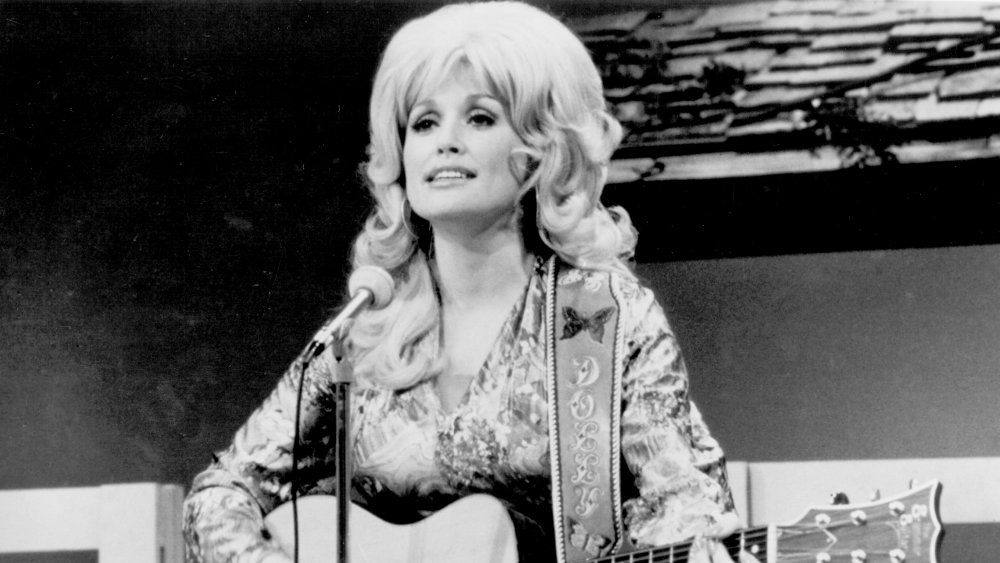 Dolly Parton performs onstage in 1974