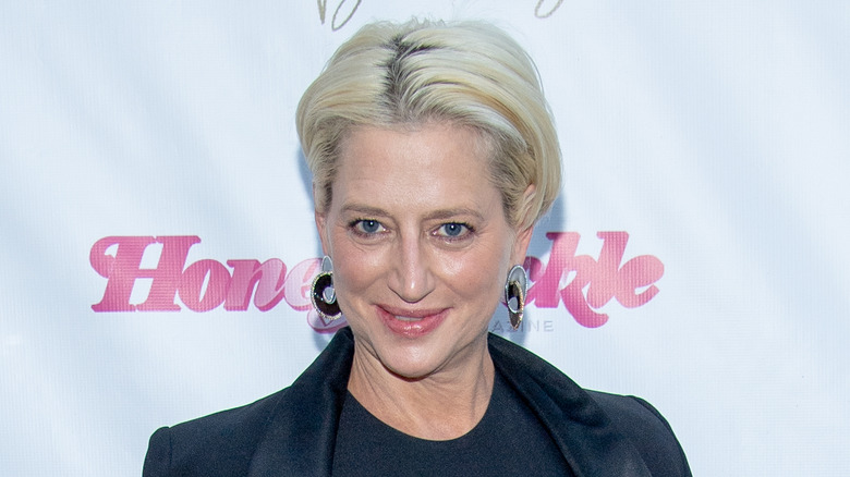 Dorinda Medley with earrings, posing