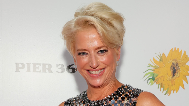 Dorinda Medley in a sleeveless dress, smiling