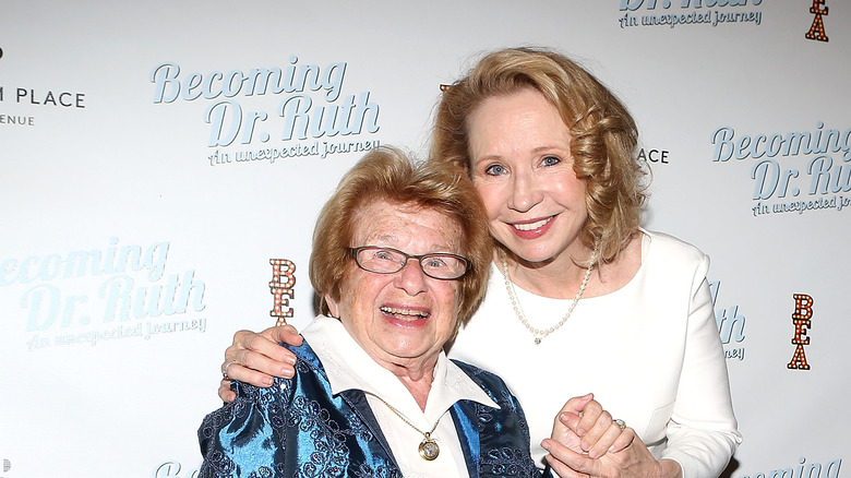 Dr Ruth and Debra Jo Rupp, arm in arm and smiling