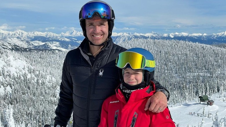 Drew Baylen,posing with Bowen on a ski trip