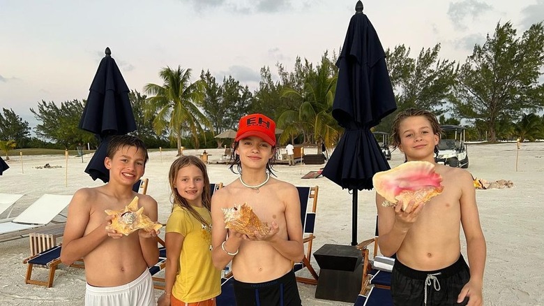 Baylen, Bowen, Callen and Rylen, posing at the beach