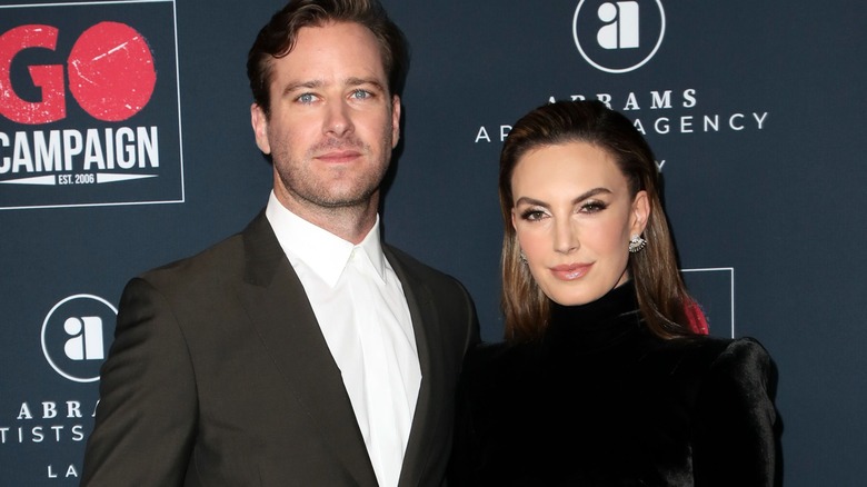 Armie Hammer, Elizabeth Chambers posing