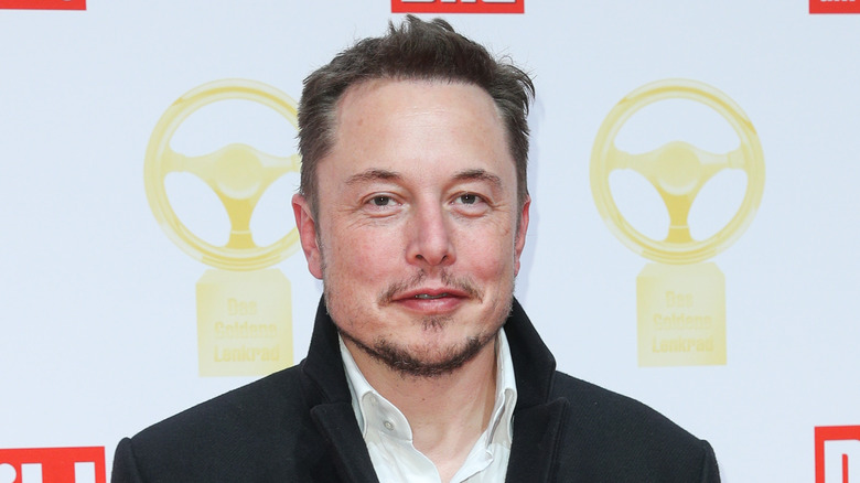 Elon Musk wearing a black jacket