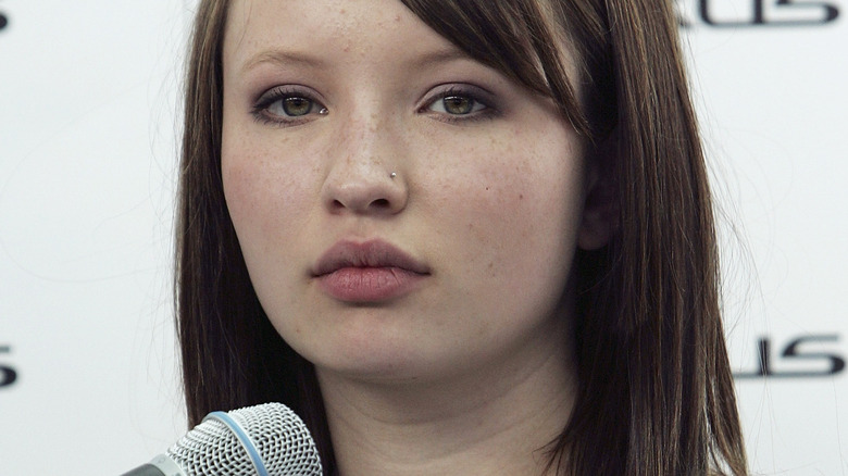 Emily Browning looking at camera