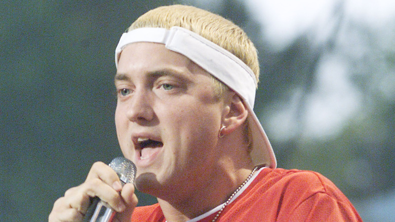 Eminem performing in a visor