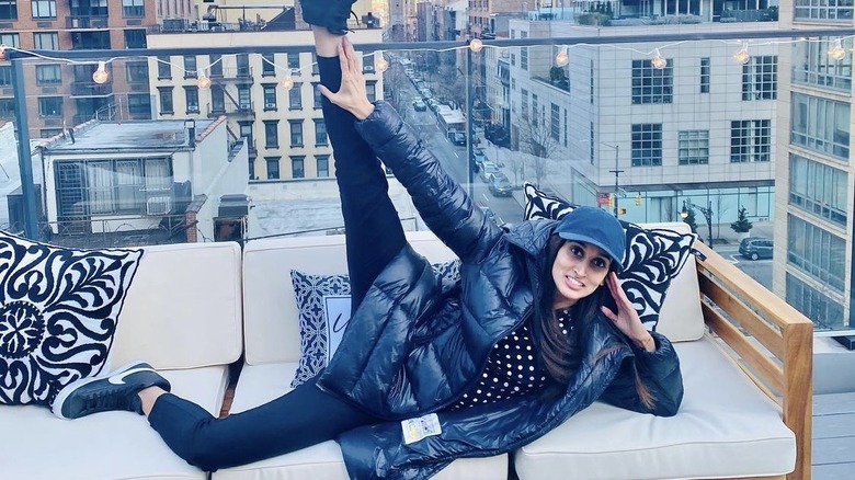 Anisha Ramakrishna, posing on a rooftop in New York City