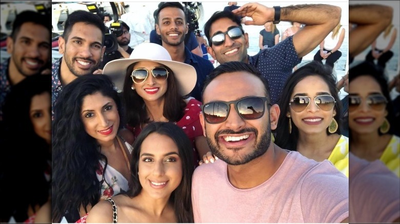 Shaan Patel taking a selfie with the rest of the Family Karma cast