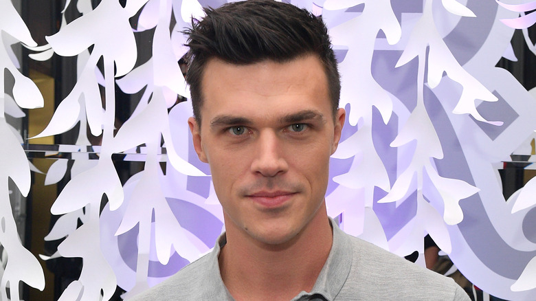 Finn Wittrock posing for cameras