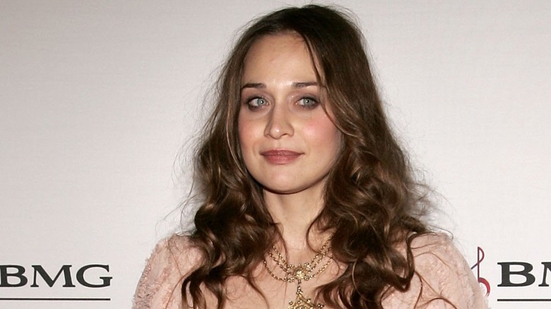 Fiona Apple posing curly hair