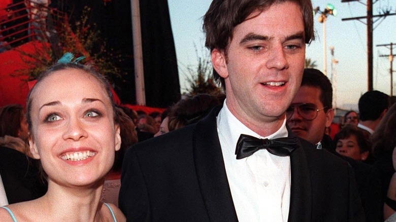 Fiona Apple smiling with Paul Thomas Anderson