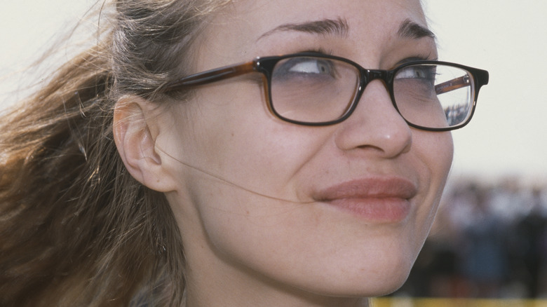 Fiona Apple smiling in glasses