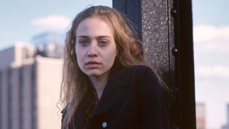 teenage Fiona Apple posing outside