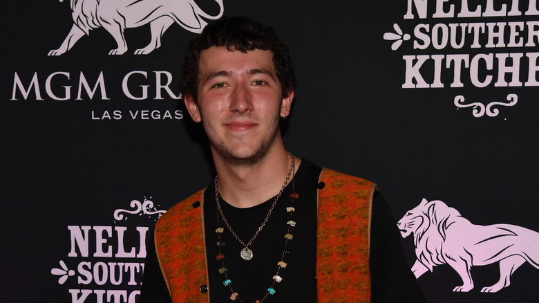 Frankie Jonas smiling on red carpet