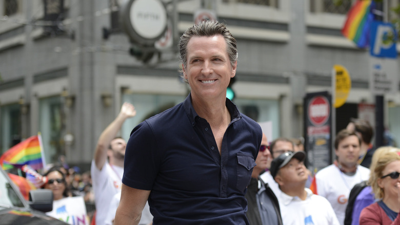 Gavin Newsom smiling at a Pride event