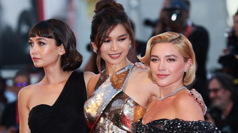 Syndey Chandler, Gemma Chan, and Florence Pugh at the Venice Film Festival