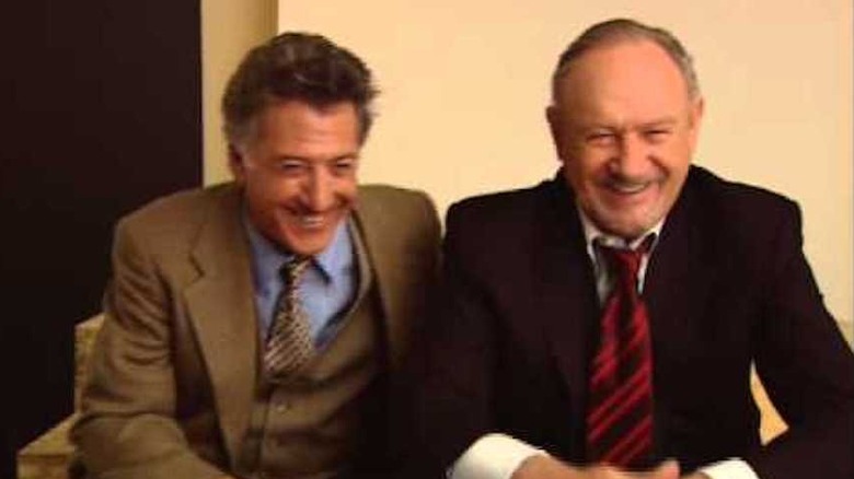 Dustin Hoffman, Gene Hackman, both laughing