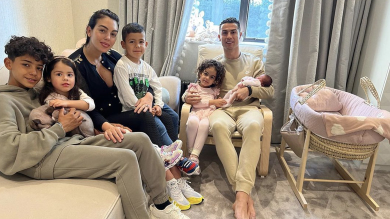 Georgina Rodriguez and Cristiano Ronaldo with kids