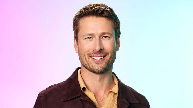 Glen Powell smiling