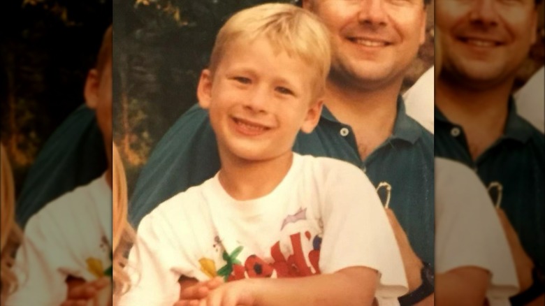 Young Glen Powell smiling