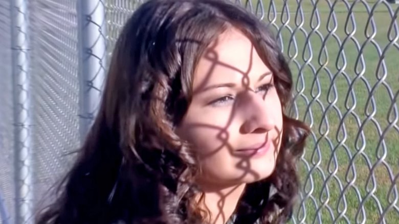 Gypsy Rose Blanchard looking out a fence