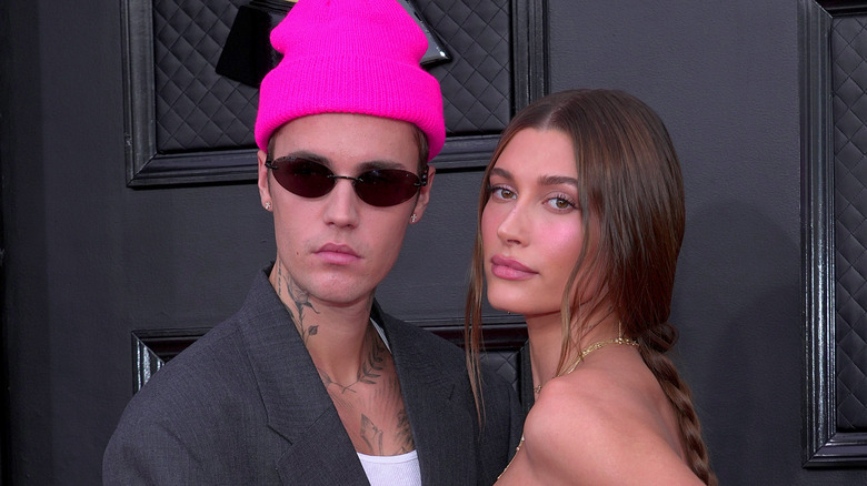 Hailey with Justin Bieber in pink hat