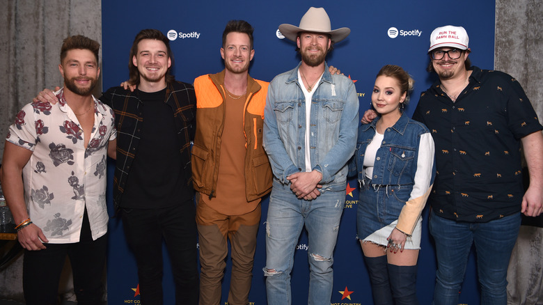 HARDY posing with fellow country stars