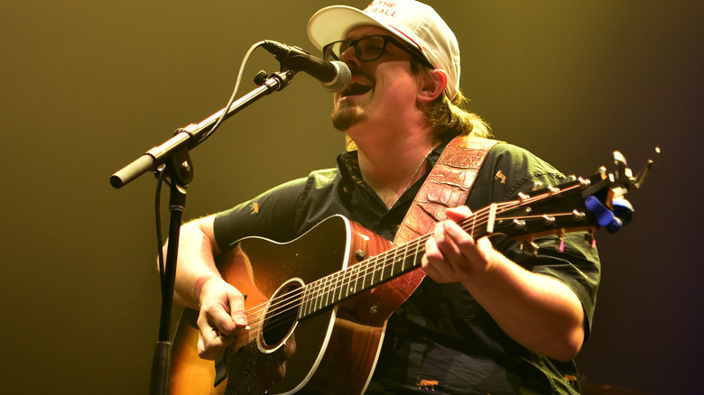 HARDY singing and playing guitar 