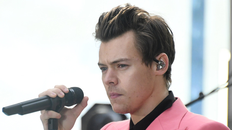 Harry Styles with microphone